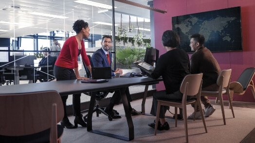 IT professionals in a conference room.