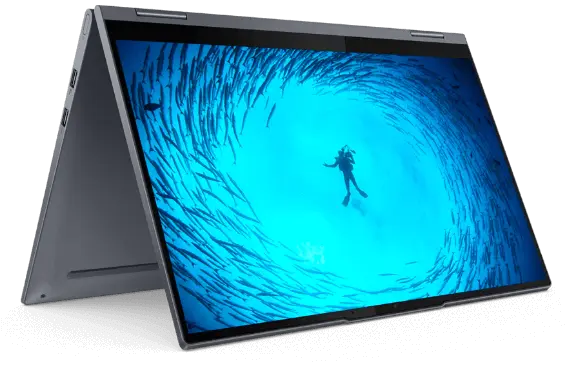 Lenovo 2-in-1 in tent mode, with display showing an image of a SCUBA diver in a clear spot surrounded by large fish swimming in a circle around the diver 